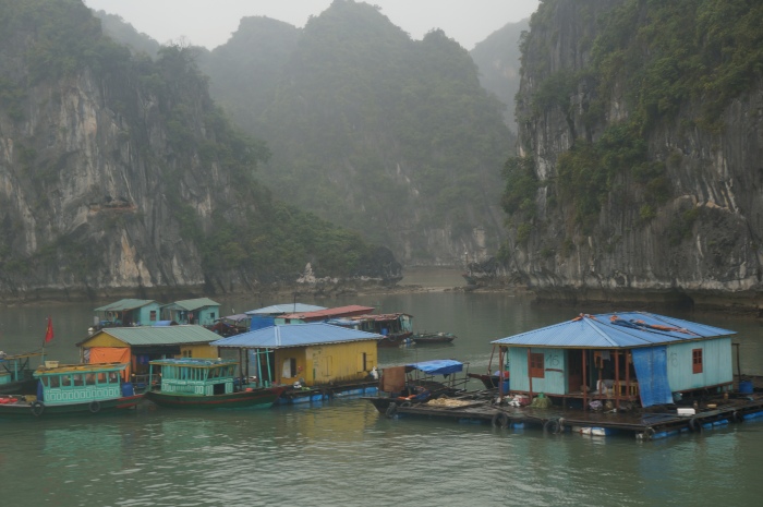 Floating village surrounded by karst formations