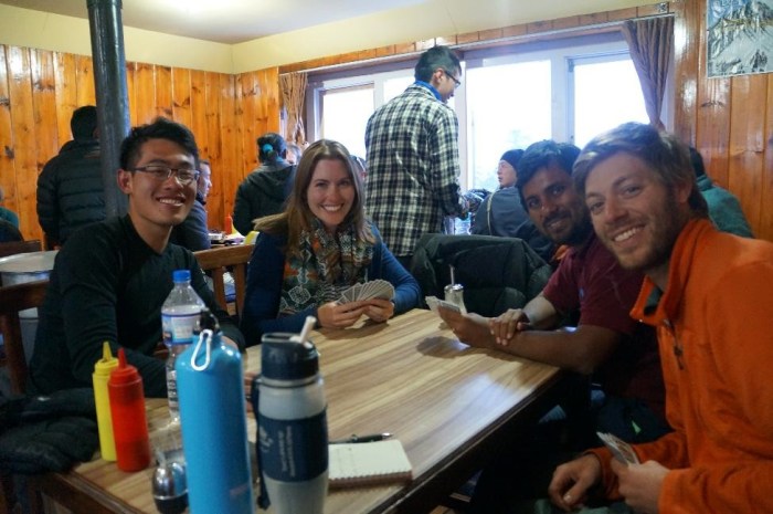 Playing cards with fellow trekkers.  Kelly and Tanveer (middle of the picture) became close friends of ours along the way.  Nick (on the left) helicoptered down to Kathmandu from Gorak Shep.
