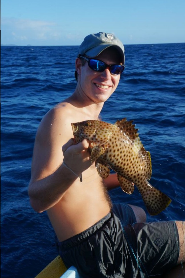As it turns out, Brian is a natural using a hand line to fish. Within a few minutes, he caught this coral cod!