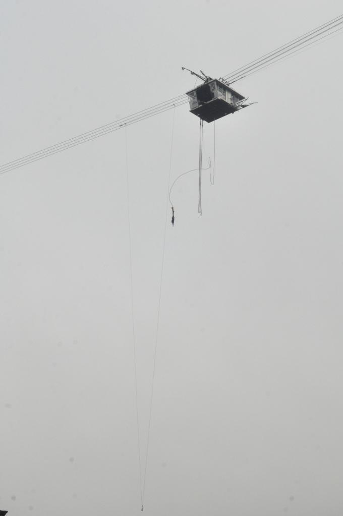 That's Alison jumping off that suspended cable car