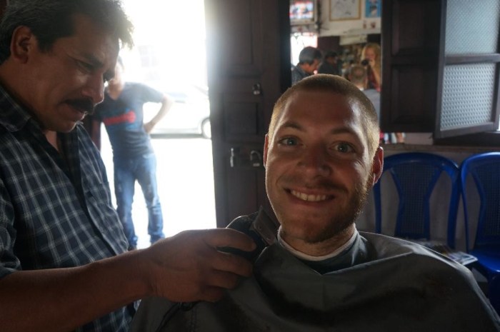 Brian enjoying his first barber cut shave!