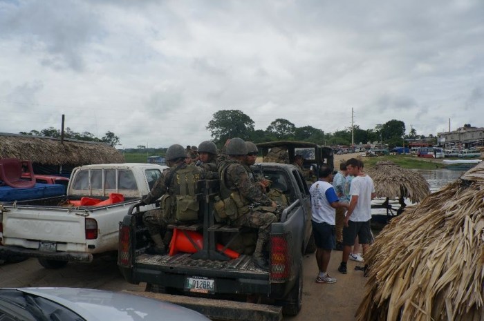 It took us over an hour to cross this 100 yard river (by barge) from Flores to Coban as we waited for the military to cross in front of us. Why don't they just build a bridge?