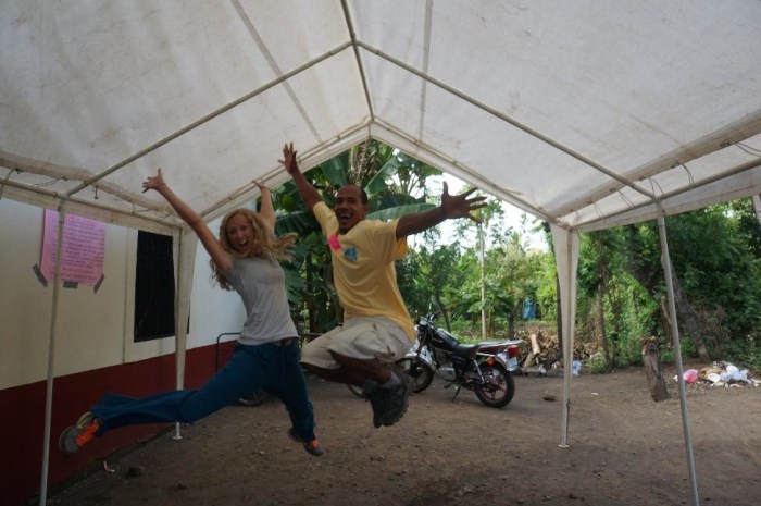 Samuel, one of our Spanish interpreters, and I before jumping on the bus.