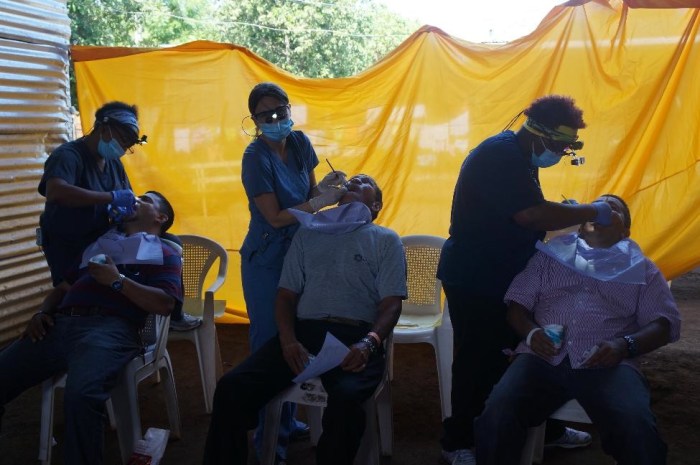 The dental team hard at work with teeth cleanings and cavity extractions.