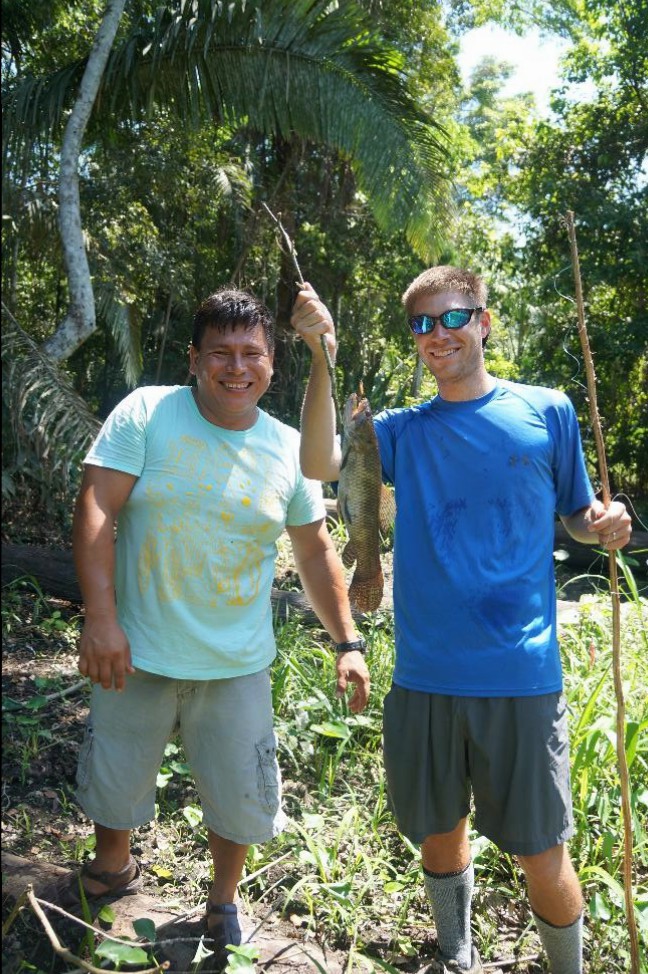 Brian showing off his catch with our guide, Ronal
