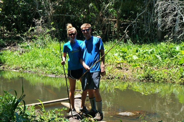 Check out our homemade fishing poles made from a tree branch. It did the trick (for Brian at least)!